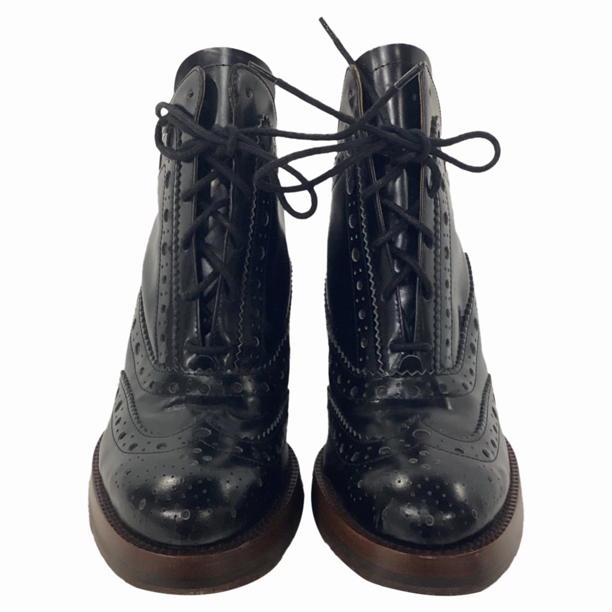 Acne Studios Spin Brogue Wedge Boots in Black Leather