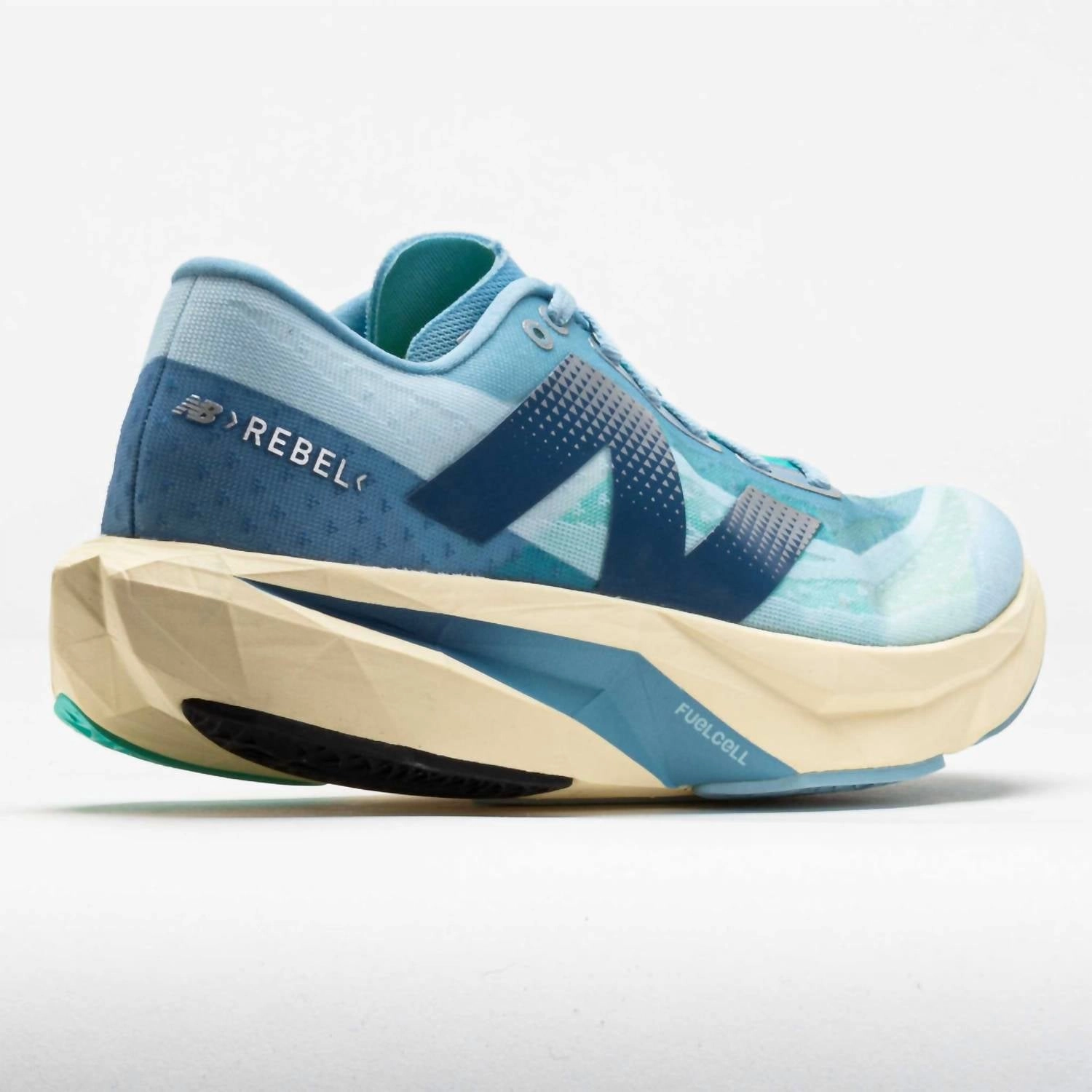 Women's Fuelcell Rebel V4 Shoes In Quarry Blue/chrome Blue/heron